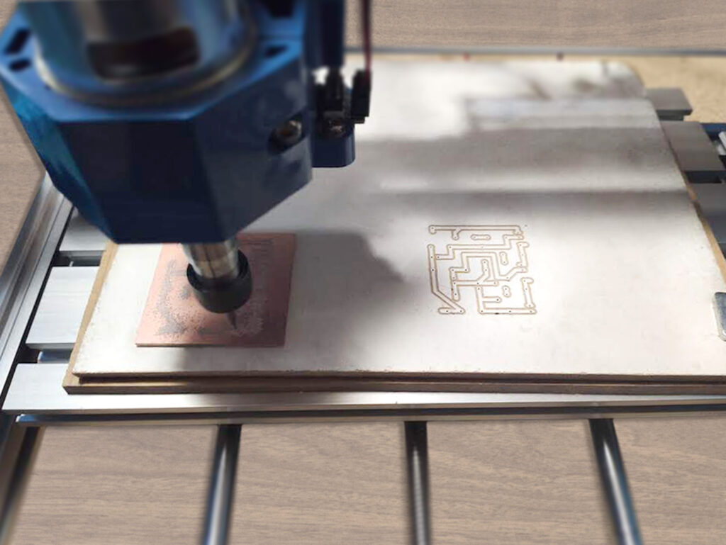 CNC Machine milling a PCB prototype of the DIY Energy Monitor