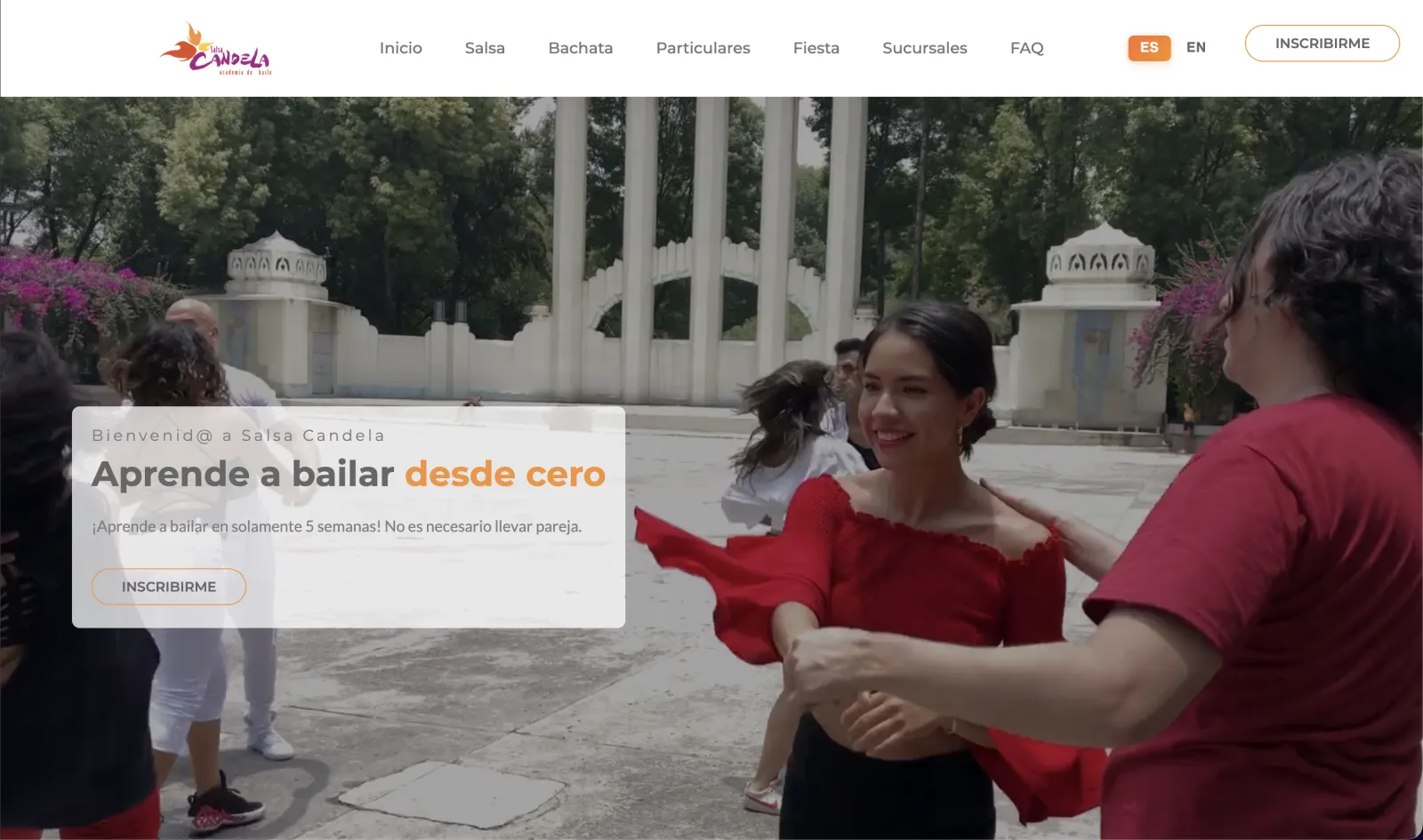 Salsa Candela homepage featuring full-screen video of couples dancing salsa with prominent call-to-action button